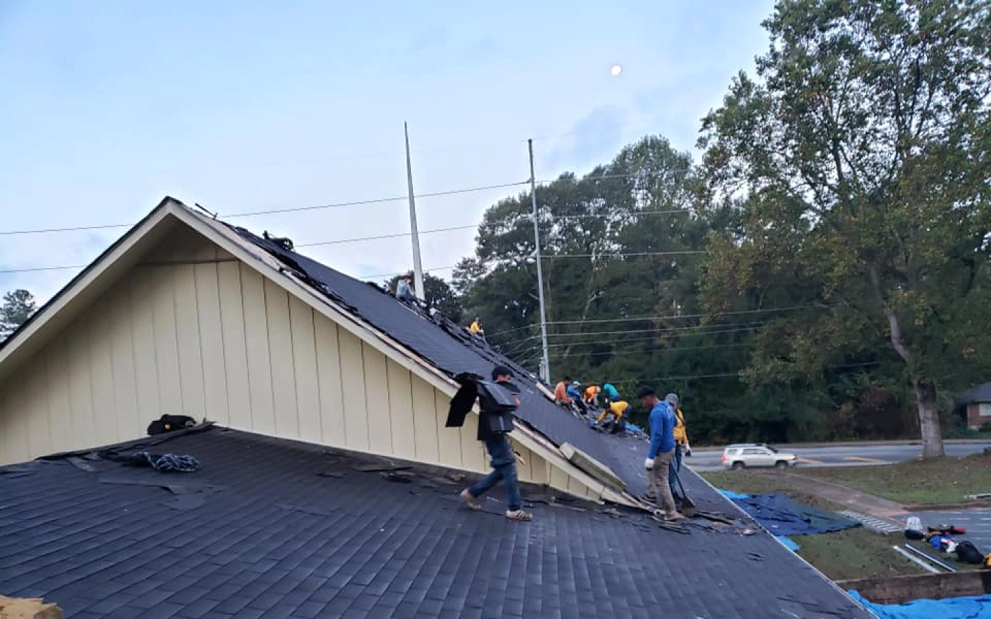 roofers replacing damage shingles lawrenceville ga